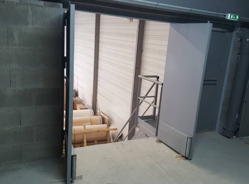 Conception, fabrication, et pose de système d'ouverture de porte métallique sur mesure à Arnas